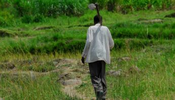 african-farmer-walking