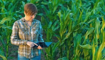 farmer-with-tablet-computer-in-corn-field