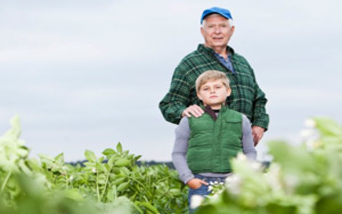farmer with grandson farm