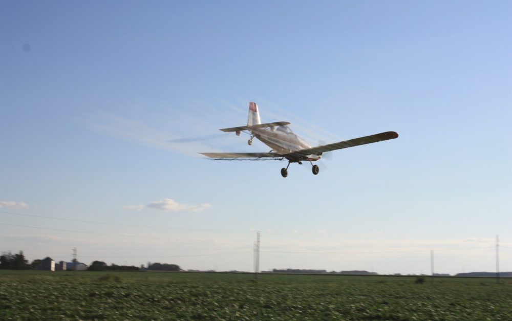 Pesticide drift from a spray plane