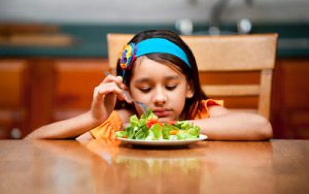 sad-girl-eating-salad