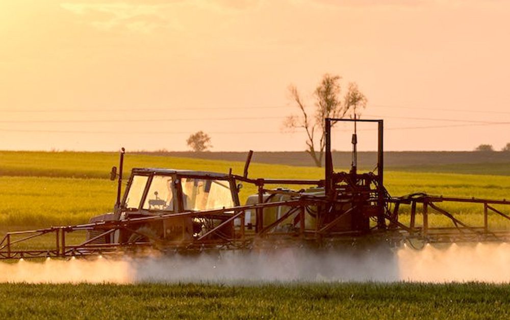 tractor-spray-pesticides-farm
